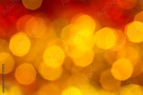 big yellow and red flickering blurred Xmas lights