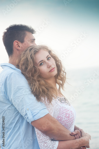 lovely young couple on the beach