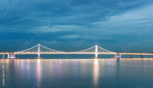 Illuminated Gwangalli Bridge in the late evening time. Busan city