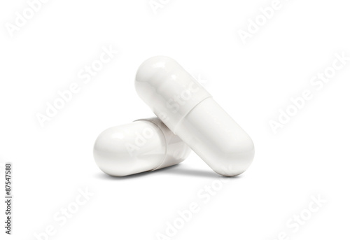 white pill capsule isolated on white background