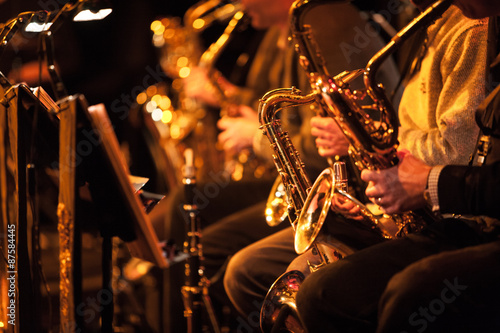 Big Band saxophone section. A candid view along the saxophone section of a big band in concert.