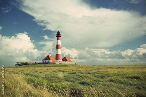 famous Westerhever lighthouse at North Sea coast, Schleswig-Holstein, Germany, Europe, vintage filtered style