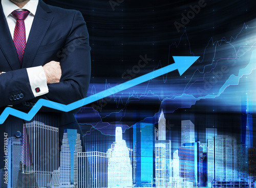 Close up of the businessman with crossed hands. Growing arrow as a concept of the success. Hologram cityscape on the front view and forex chart on background.