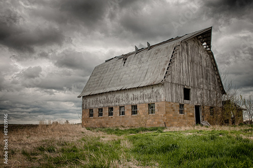 Stormy barn. Old barn on prairie with stormy sky, USA