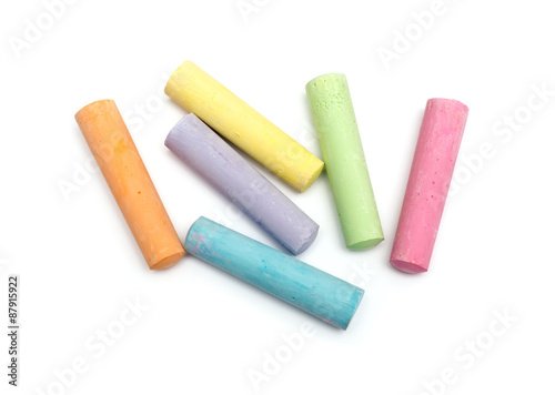 chalks in a variety of colors arranged on a white background