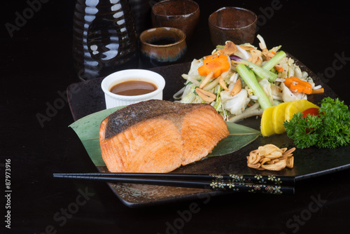 japanese cuisine. fried fish on the background