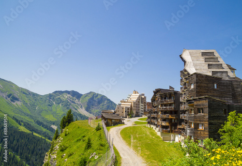  Strange wooden buildings in Avoriaz , French mountain resort, in the middle of the Porte du Soleil , Alps Mountains.
