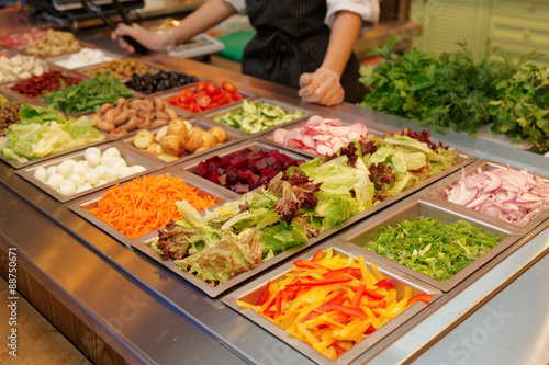 Salad bar with various fresh vegetables