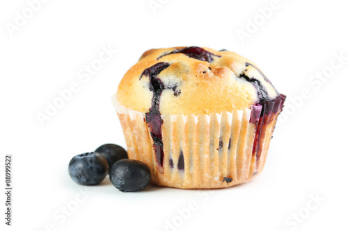 Tasty blueberry muffin isolated on a white