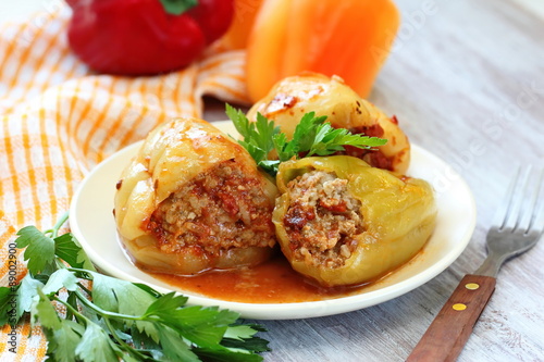 Baked peppers stuffed with meat, rice and vegetable