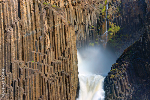 Detail of the Litlanesfoss waterfall with its basaltic columns in Iceland