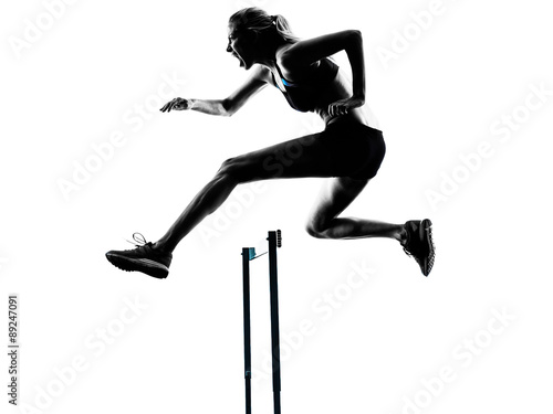 woman hurdlers hurdling silhouette