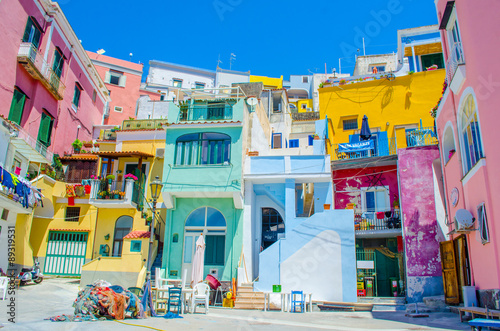 italian island procida is famous for its colorful marina, tiny narrow streets and many beaches which all together attract every year crowds of tourists coming from naples - napoli.