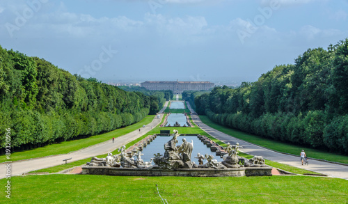 2 kilometers long promenade leading through gardens of imperial palace in caserta is decorated by many fountains and statues from bernini and ends by artificial waterfall.