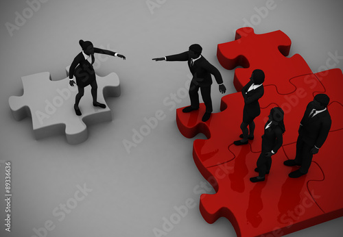 Recruiting an executive while on a jigsaw puzzle. A successful team recruiting a candidate like pieces of a jigsaw puzzle.