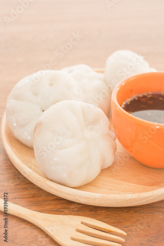 Steamed dumpling stuff on wooden plate