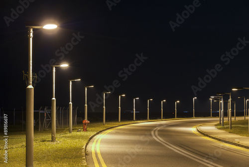 Street light and empty street at night