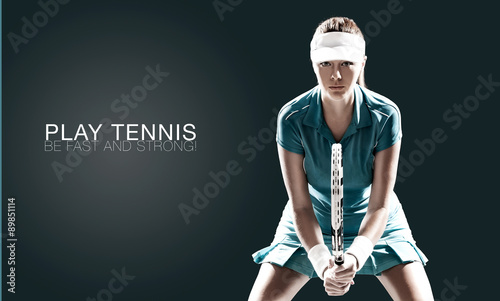 Portrait of beautiful sport woman tennis player with a racket