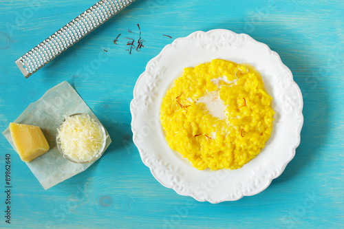 Risotto "Milanese" with saffron and parmesan cheese. Italian Cuisine.