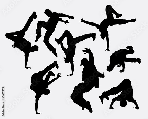 People breakdance silhouettes