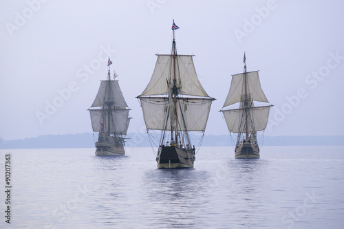 The Susan Constant, Godspeed and Discovery, re-creations of the three ships that brought English colonists to Virginia in 1607, flying the English and Union Jack flags and sailing down the James River on May 12, 2007, as part of the 400th Anniversary program of the founding of Jamestown, Virginia