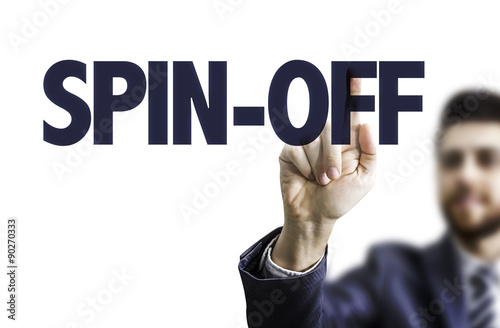 Business man pointing the text: Spin-Off