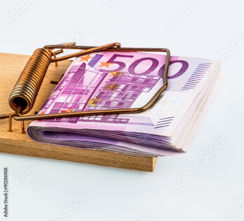 euro notes in mousetrap