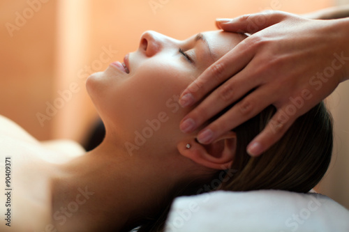 Beautiful woman having an head massage