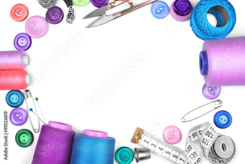sewing items on white background
