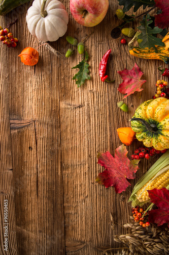 Autumn background with pumpkins, close up.
