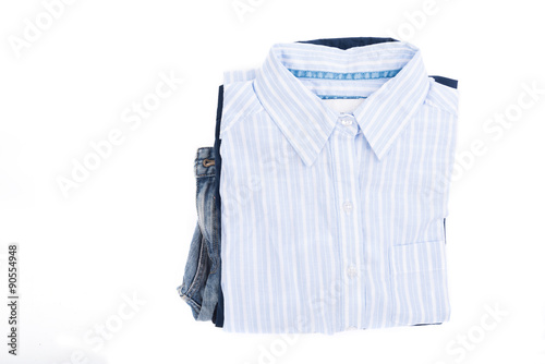 Blue shirts and jeans isolated on white background