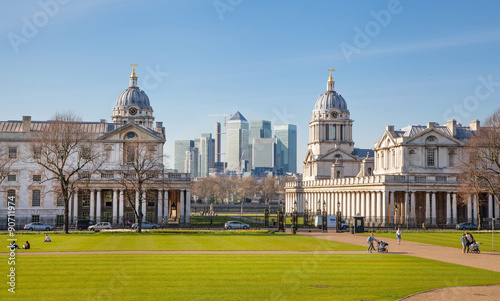 LONDON, UK - APRIL 14, 2015: Canary Wharf view from the Greenwich hill. Modern skyscrapers of banking aria