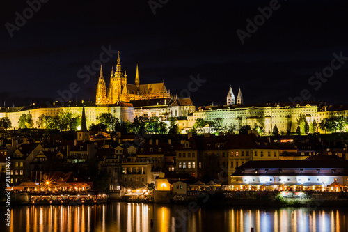 The historic center of Prague, ancient architecture, and cultural heritage/Prague at night Charles Bridge to the river and the old town center