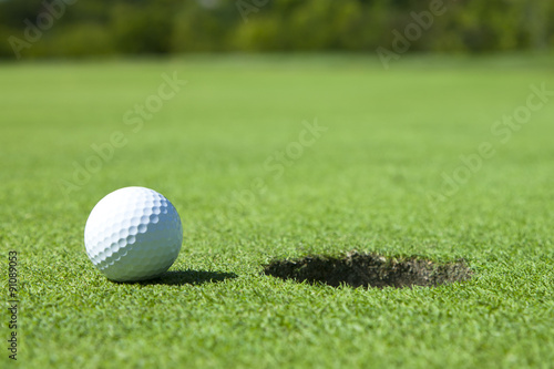 Golf Ball by Hole