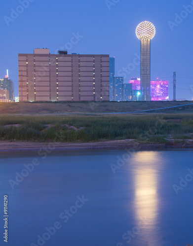 Reunion Tower in downtown Dallas, Texas reflecting in Trinity Ri
