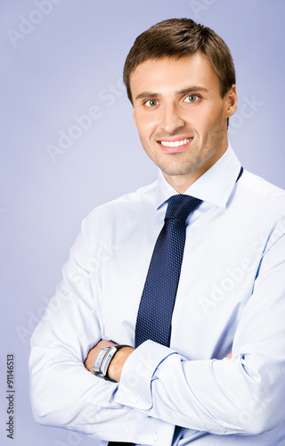 Portrait of business man, over violet background