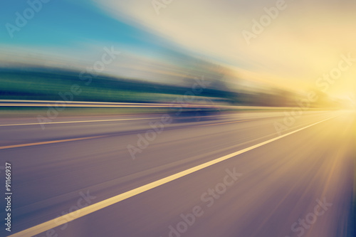 abstract empty asphalt blurry road and sunlight with space