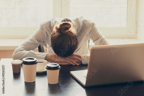 Stressed businesswoman in the office. Tired woman working at home. Business, stress, people, depression, pressure, career, crisis, problems concept