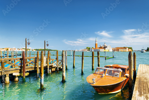 Boat parked beside the Riva degli Schiavoni, Venice, Italy