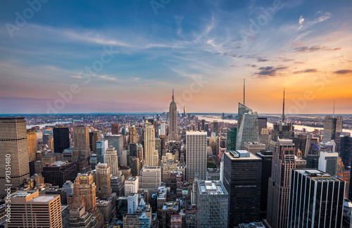 New York City midtown skyline at sunset.