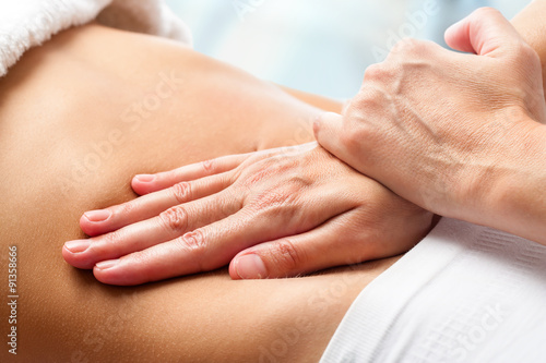 Osteopathic belly massage.