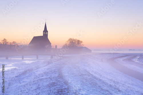 Church in winter at sunrise, Oudendijk, The Netherlands