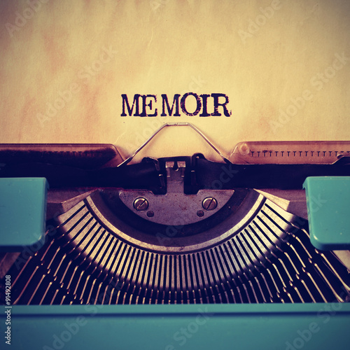 retro typewriter and word memoir written with it
