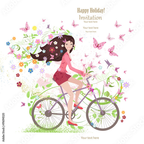 Cute young girl on a bike with butterflies and flowers
