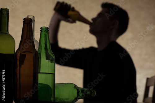 Teenager drinking beer