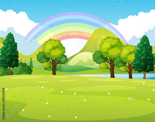 Nature scene of a park with rainbow