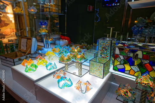Christmas stand with souvenirs made of colored glass