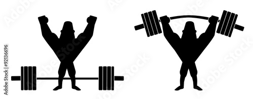 Sportsman lifting heavy barbell. Silhouette