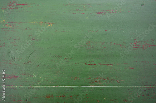 Dark green rustic wood background.