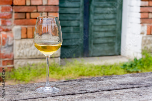 Glass of Sauvignon Blanc on wooden table